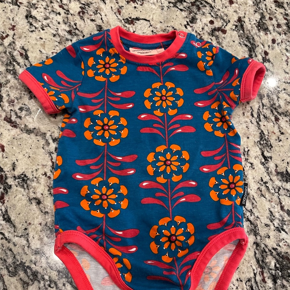 Playful Blue and Orange Bodysuit with Sun Motifs